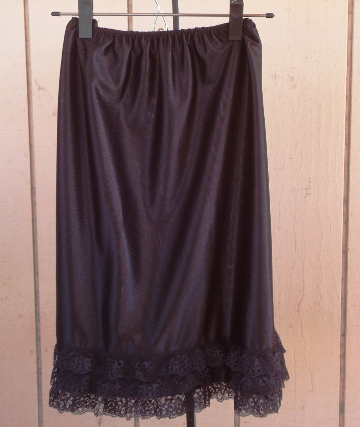 Black slip extender with three tiered layered lace.