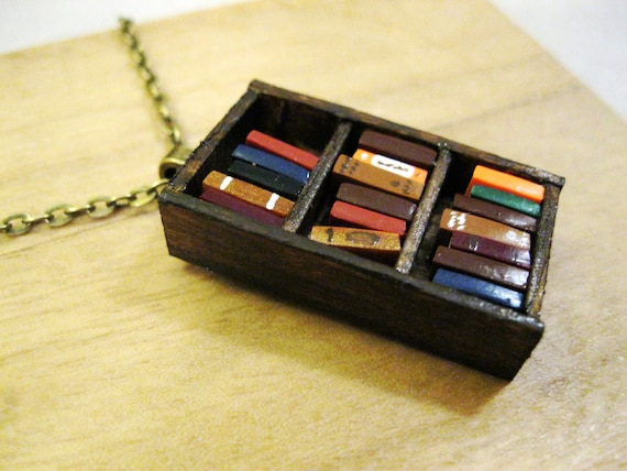 https://www.etsy.com/listing/85837233/antique-bookshelf-necklace-book-jewelry?ref=shop_home_active_3