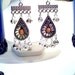 Chandelier earrings, Minoan style. Silver tone with orange stone and bells. Women's ethnic jewelry. Belly dance earrings.