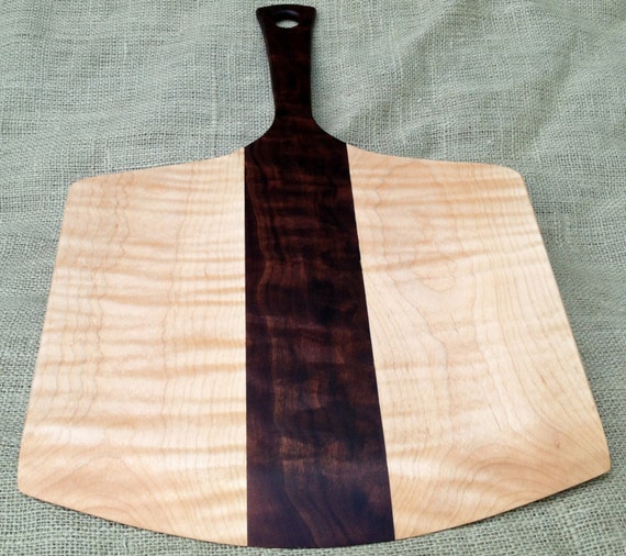 Handmade wooden pizza peel paddle from figured black walnut