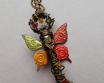 Butterfly Winged Key Pendant -- Autumn Red, Orange, Yellow, Green Patterned Butterfly Winged Wire Wrapped Antique Key with Swarovski Crystal