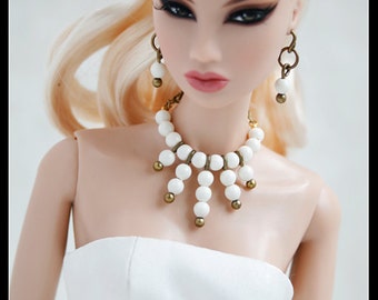 Collar Necklace Dangling with White Swarovski Pearl. Set Completes with Matching Earrings.