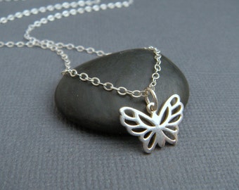 silver butterfly necklace. sterling silver necklace. simple jewelry. everyday. delicate. dainty. nature. small butterfly wings.