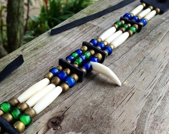 Coyote tooth, bone hair pipe choker, green, blue Native American Indian style, brass, copper, white, black, deerskin leather, trickster