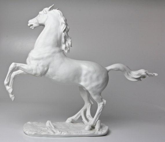 white porcelain horse statue