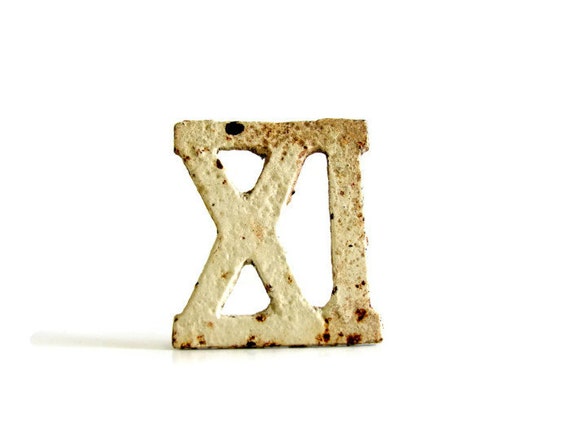 xi-cast-iron-roman-numerals-vintage-architectural-salvage