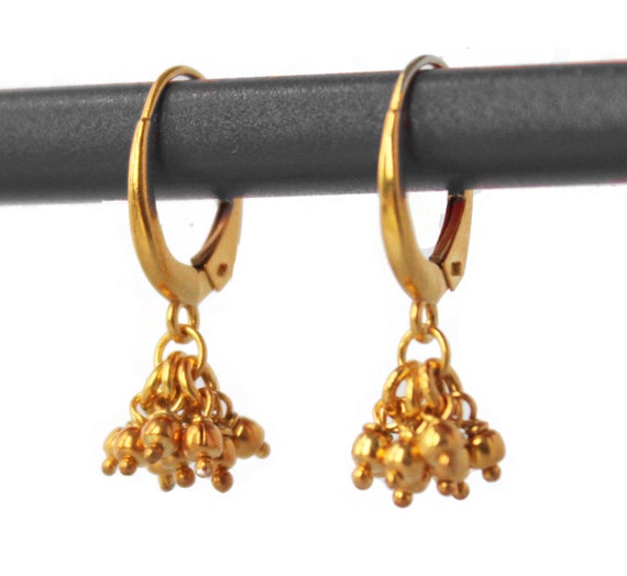 delicate gold earrings