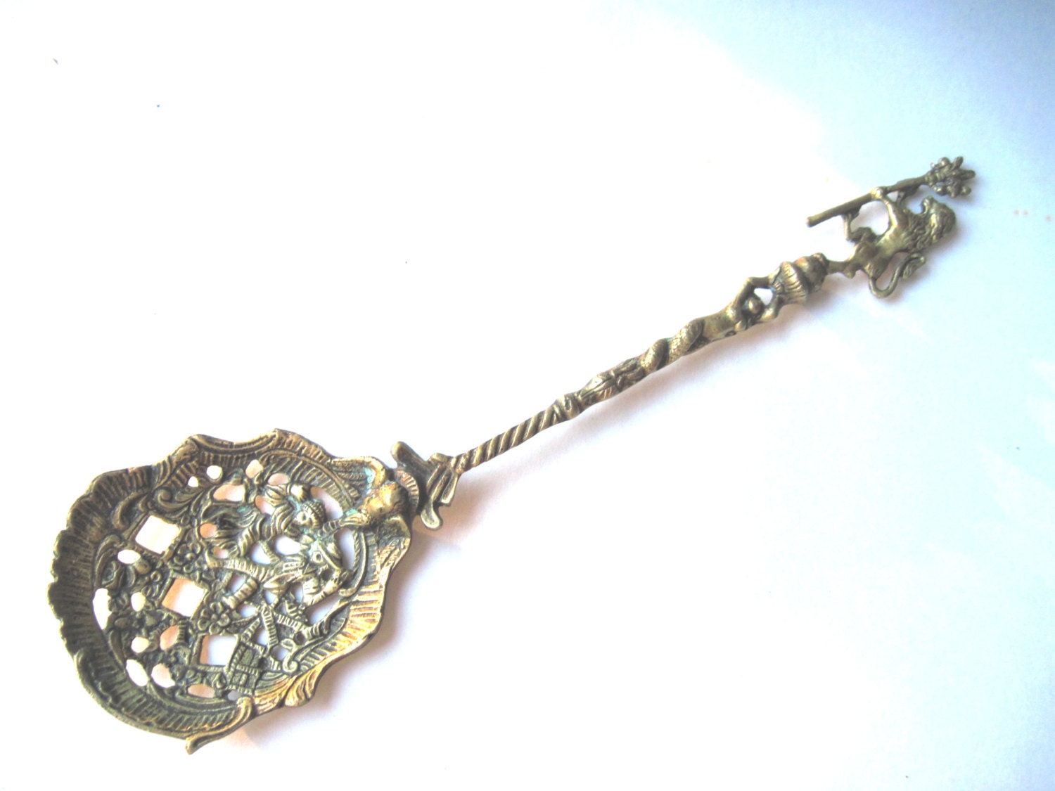 Italian brass slotted spoon large intricate regal by southcentric