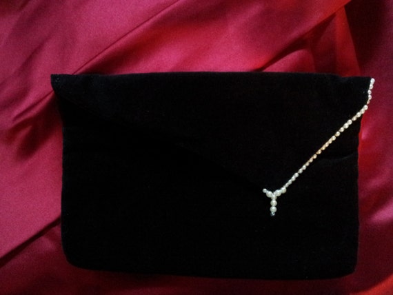 black clutch with pearls