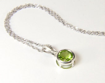 Flawless Peridot, 8mm x 2.25 Carat, Round Cut, Sterling Silver Pendant Necklace, including 18" to 20" (adjustable) Sterling Chain