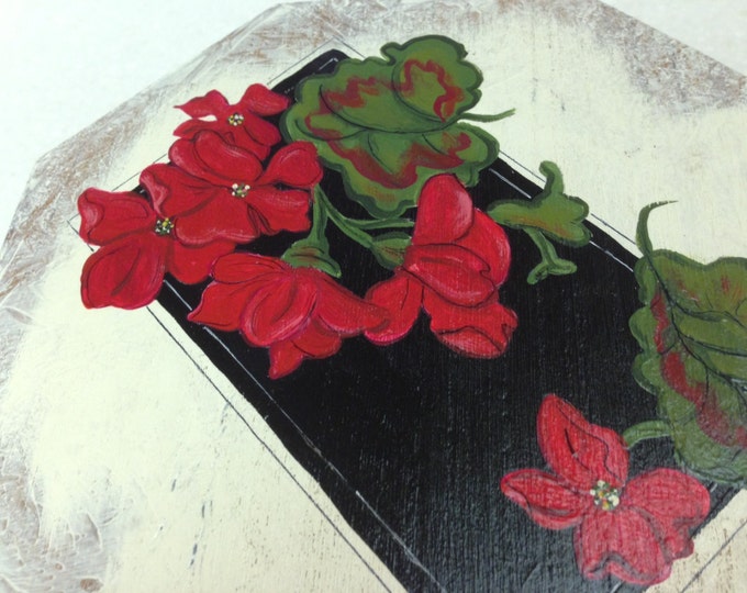 8 1/4" x 8 1/4" x 4" Solid Wood Octagon Shaped Box, with Hinged Lid. Geraniums painted with acrylics on top.