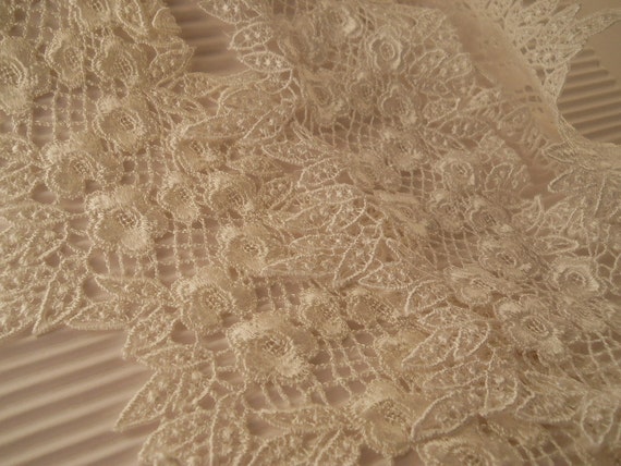 LACE: Bridal lace white or off white 5 1/2 inches wide 1