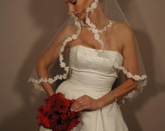 Wedding veil circular 42" long with lace trimmed.