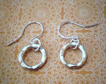 Sterling Silver round hammered circles.