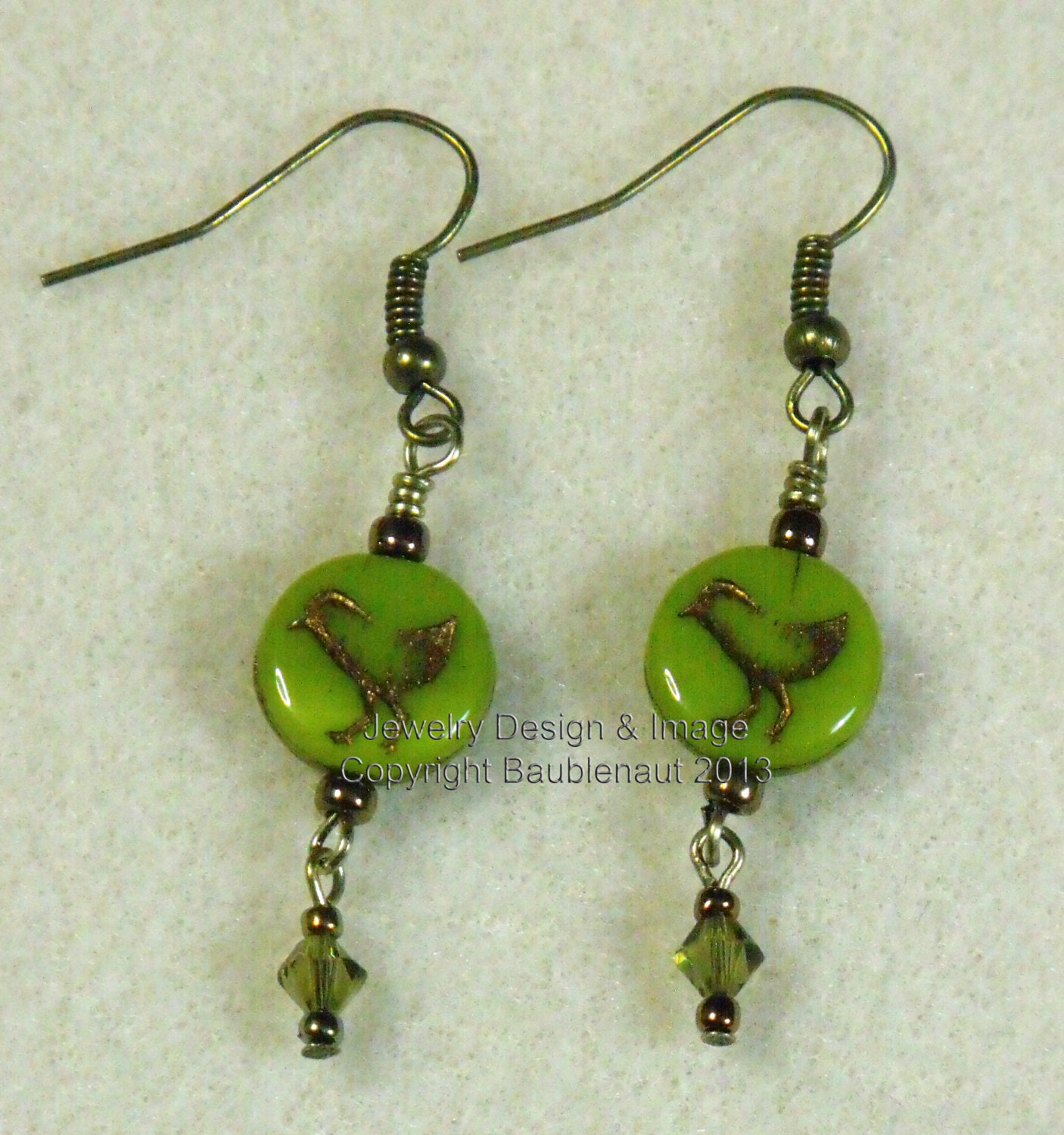 Green and bronze Czech glass bird bead earrings
