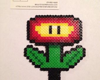 Items similar to Super Mario Fire Flower Plush- Eco Friendly Felt on Etsy