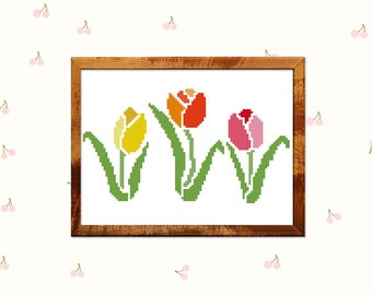 Tulip cross stitch pattern. Spring decorations. Trendy Tulip design, Flower decoration in yellow orange and red