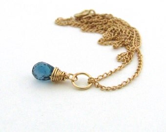 Tiny london blue topaz necklace, December birthstone, small london blue topaz pendant, gold wire wrapped necklace, blue stone necklace