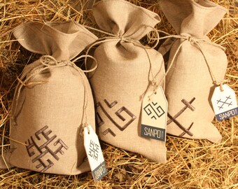 Natural linen gift bag with Latvian Sign PĒRKONA KRUSTS embroidery
