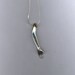 Doll arm pendant