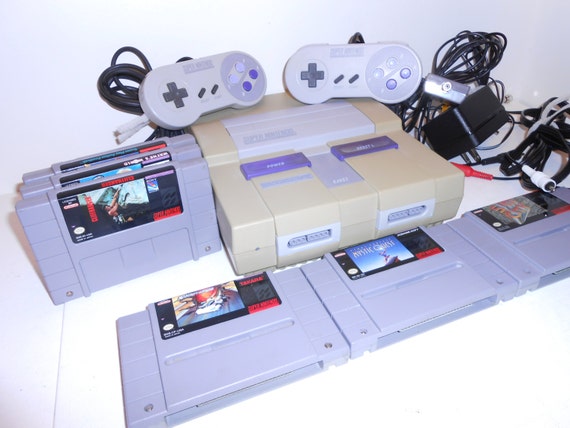 1990s Super Nintendo Entertainment System with by hollister54