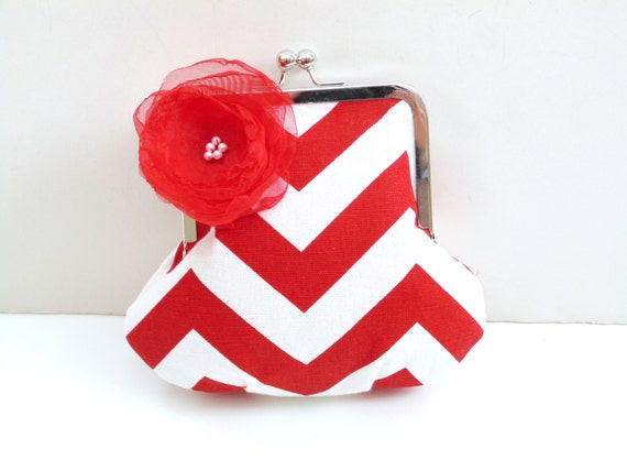 red and white clutch bag