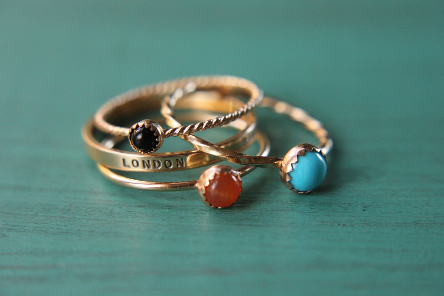 3 solid 14k gold gemstone stacking rings and custom band set