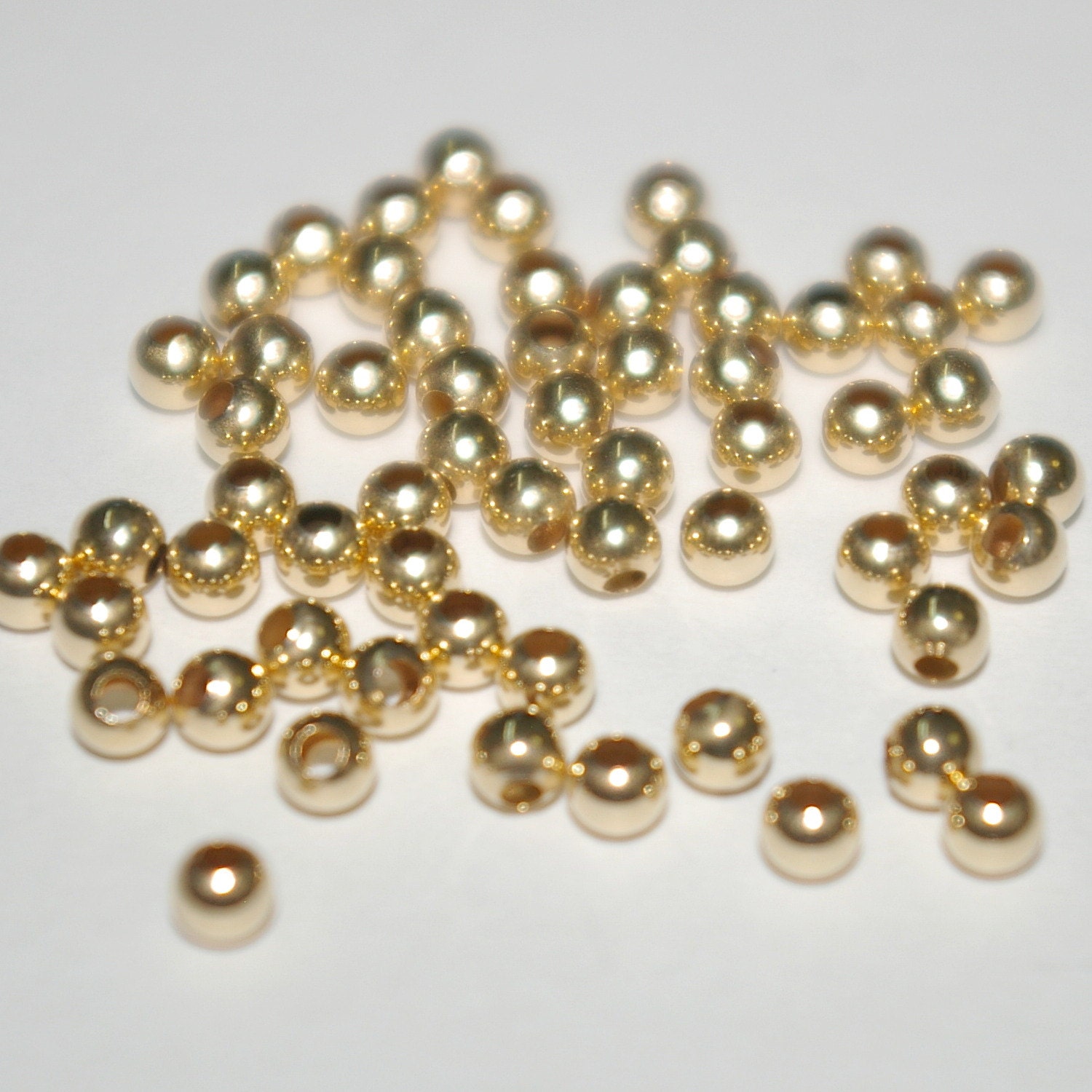 100 pieces 14kt GOLD FILLED 3mm Round Seamless Spacer BEADS