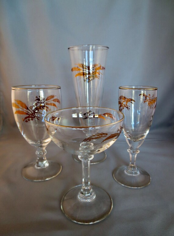 Items similar to Vintage Gold Leaf Stemware Four Sizes Clear Glass