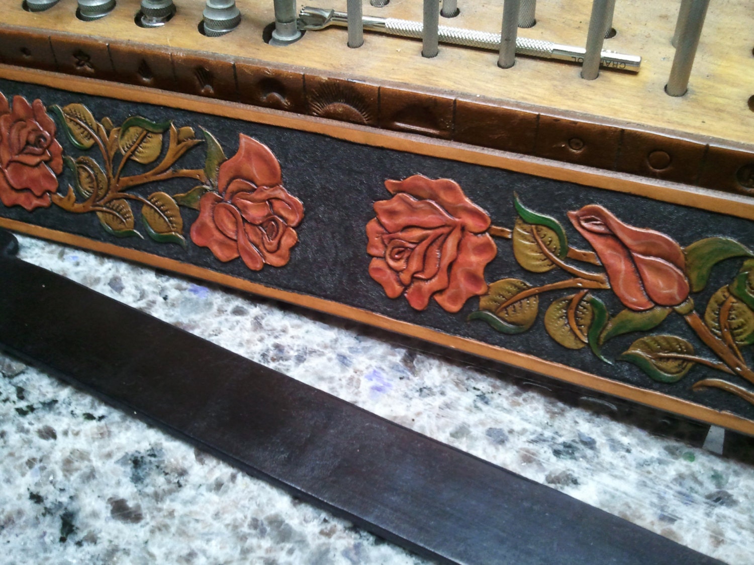 Leather Guitar strap hand carved and tooled Roses. hand dyed