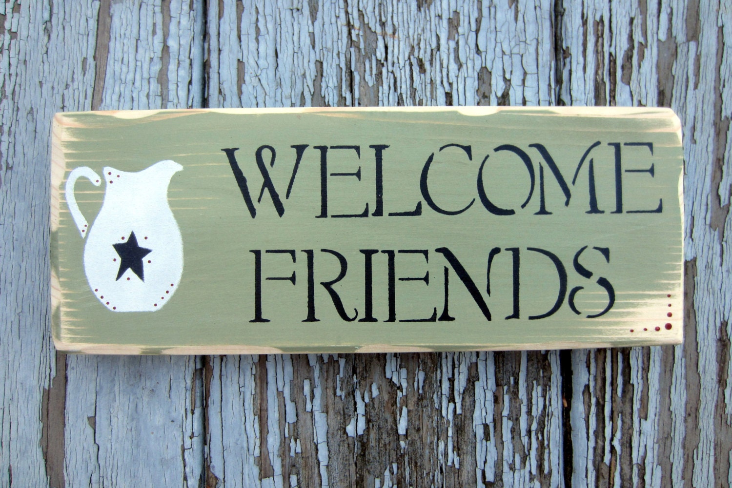 Friends with pitcher sign