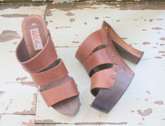 Vintage WOODEN CLOGS....size 8 womens....wedges. high heels.