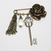 brooch, kilt pin, safety pin charm collection, charm collection brooch, safety pin charm collection