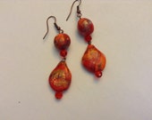 Red-Orange marblized, Hand Sculpted bead Earrings with Antiqued Gold accents