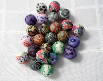 259- Perle en pâte polymère, couleurs mixte, 10mm de diamètre (25 pièces)