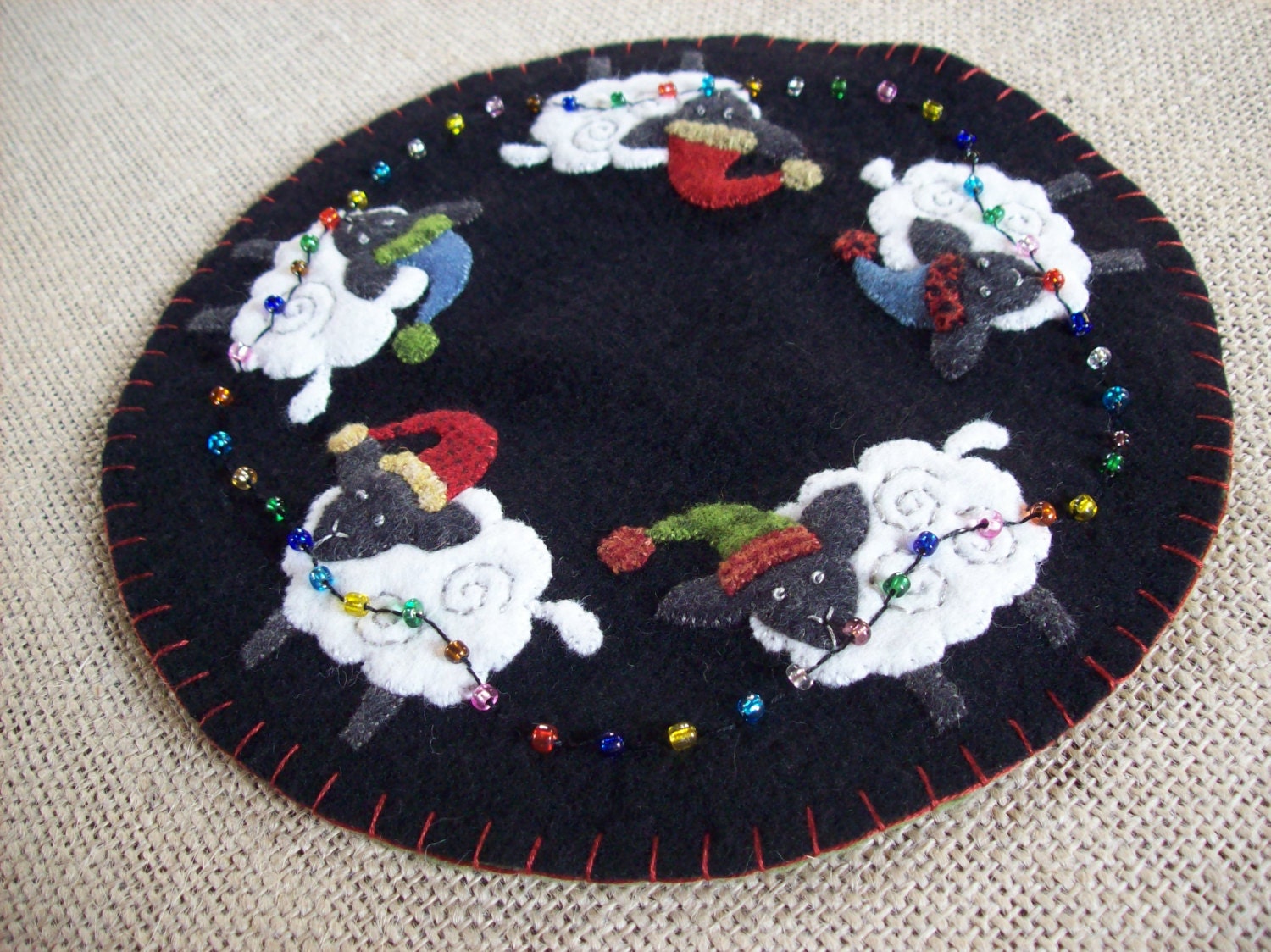 crazy christmas sheep stringing the lights candle mat crazy christmas sheep stringing the lights candle mat