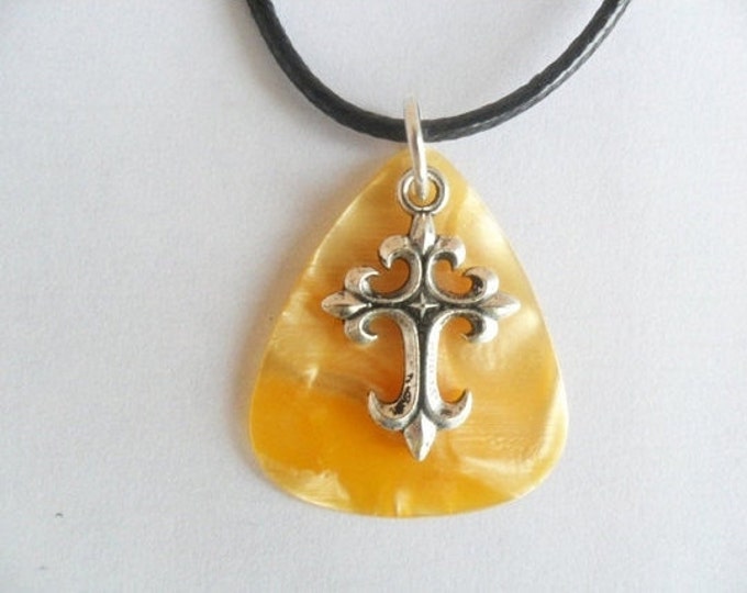 Orange cross Guitar pick necklace with adjustable cord.