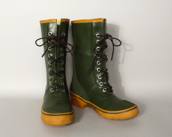 green rubber boots with yellow laces
