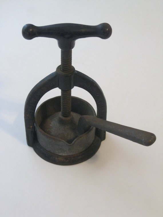 Antique Cast Iron Columbia Meat Juice Press by circaonetsy on Etsy