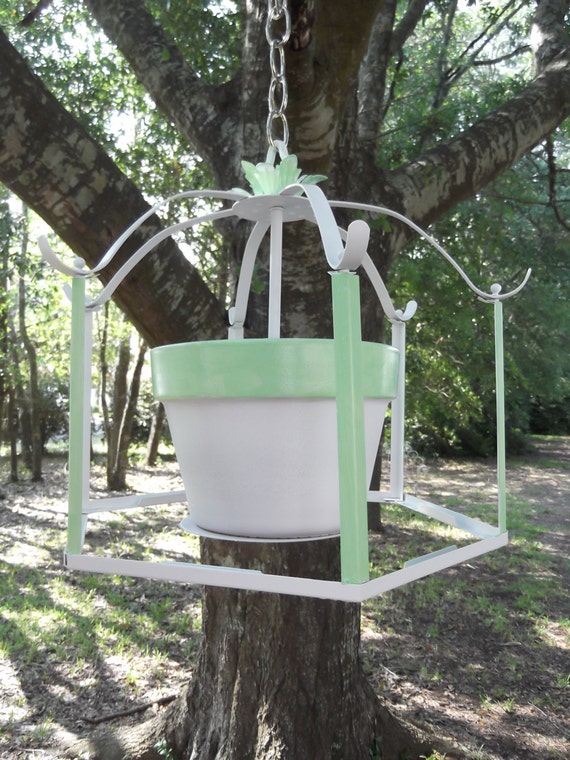 Items similar to upcycled chandelier hanging planter, candle holder