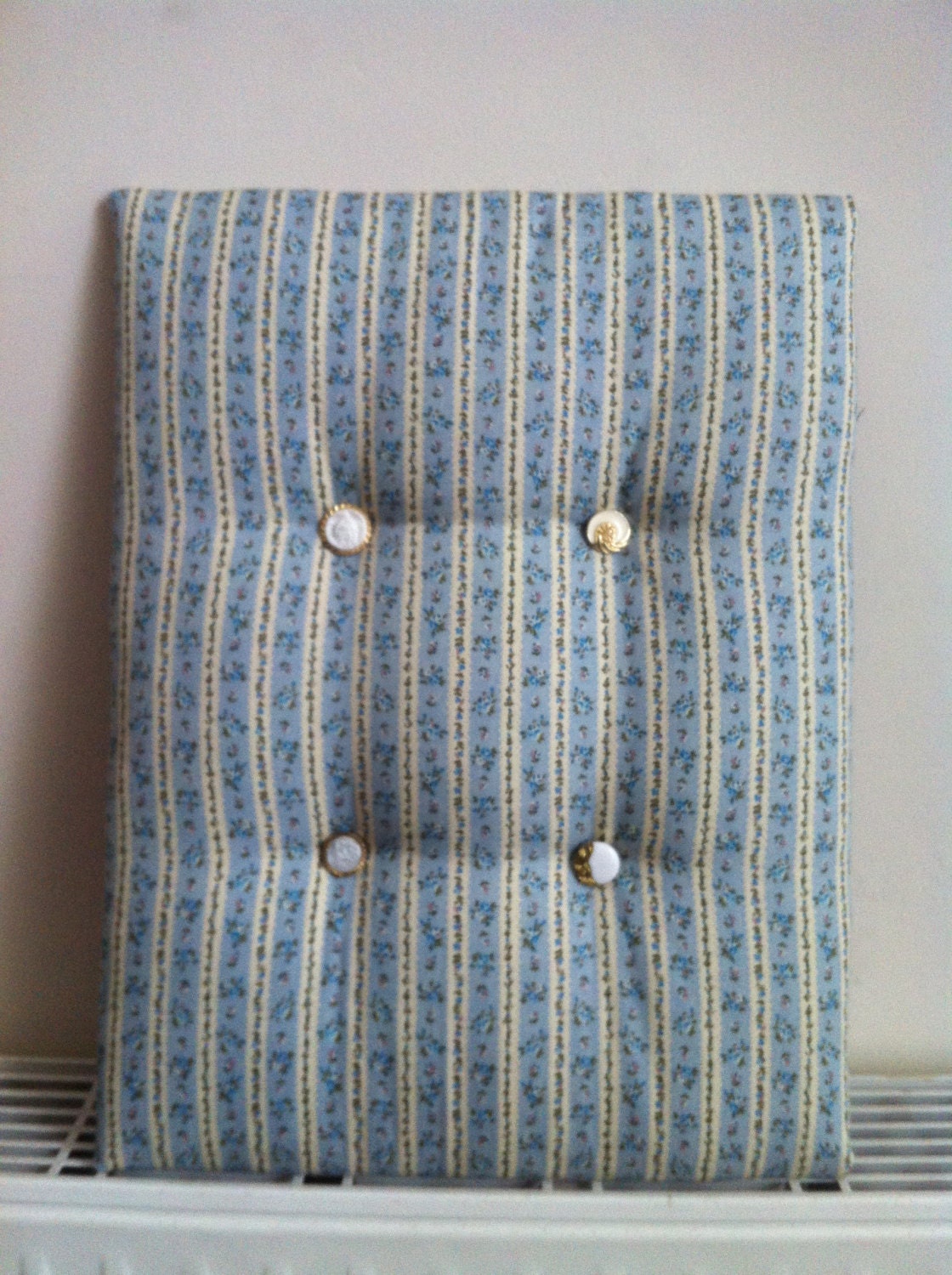 Padded fabric message board