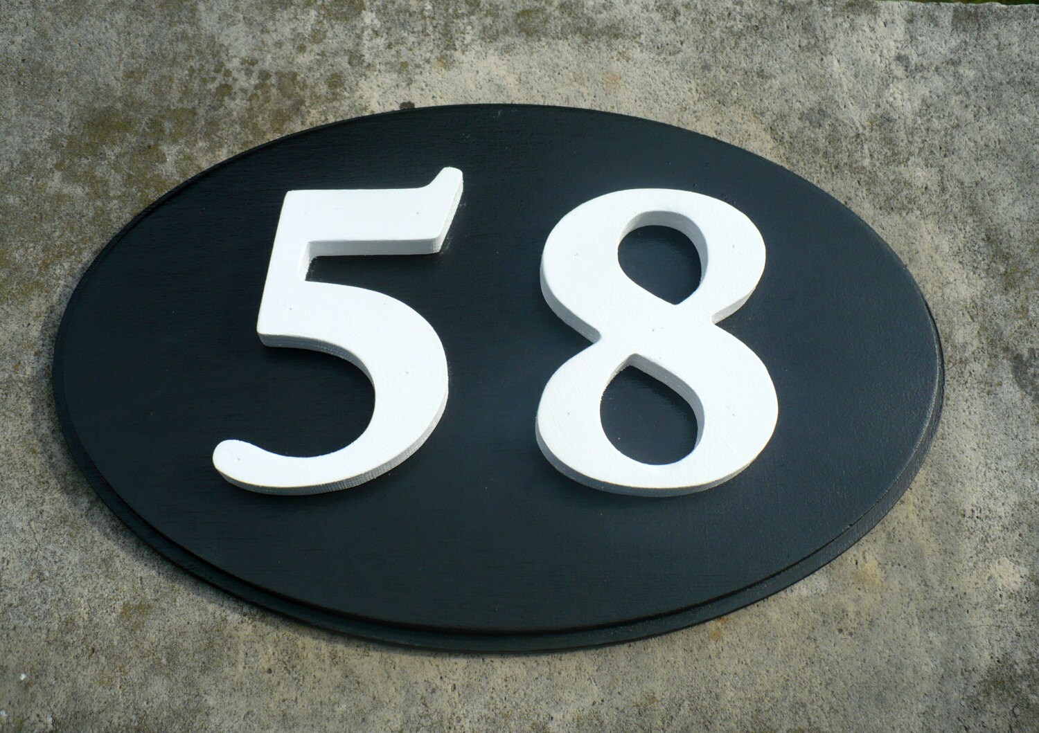 Outdoor house number plaque. House numbers. House number