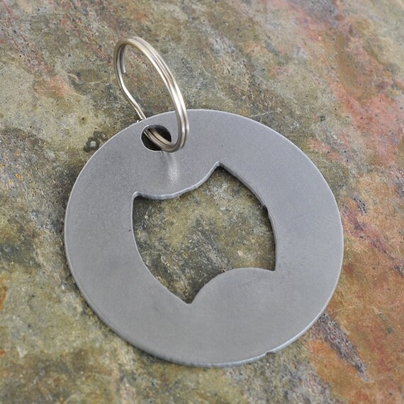 Round metal bottle opener by MoonLadders on Etsy