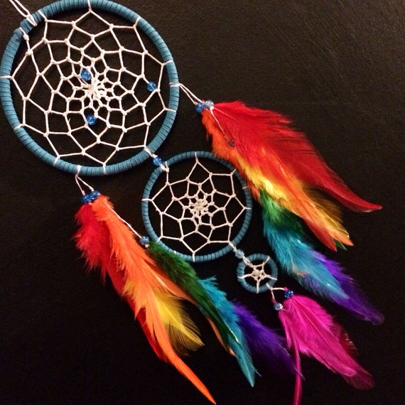Items similar to Rainbow triple dream catcher, white beaded web