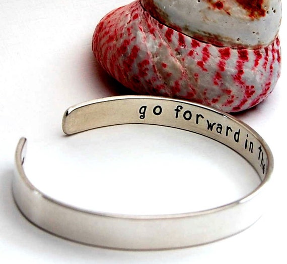 https://www.etsy.com/uk/listing/155015136/personalised-silver-bangle-7x15mm?ref=shop_home_feat_3