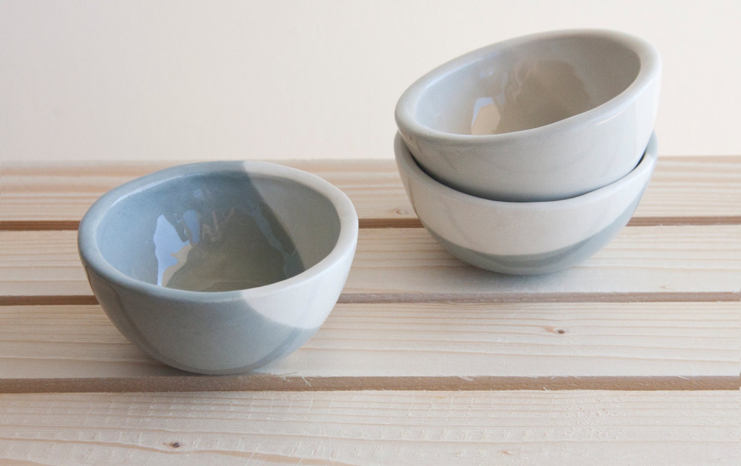 Set of three little bowls in concrete gray and white with