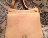 cream suede handbag