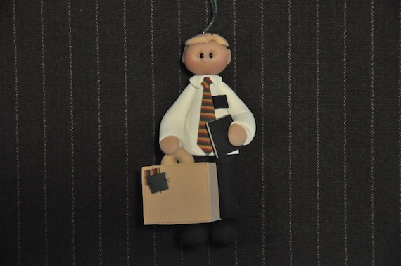 This LDS missionary is ready to serve. He is approximately 3 1/4 inches tall, made from polymer clay. Each ornament is sculpted by hand.
