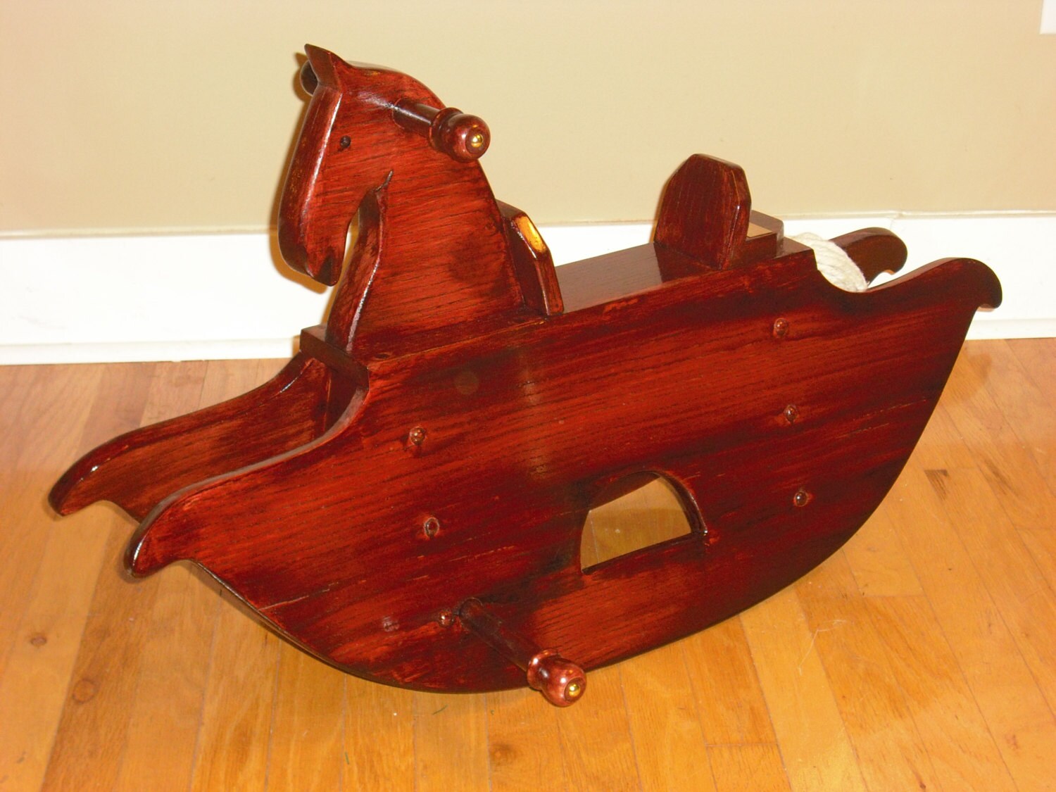 Childs wooden rocking horse