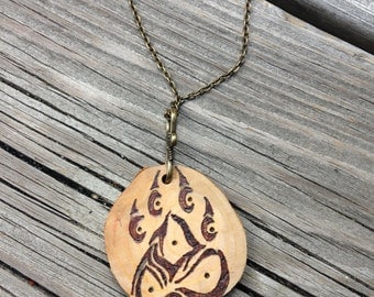 Tribal Wolf Print Wood Burned Necklace